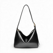 Black slouchy PU faux leather hobo bag with adjustable shoulder strap, front view