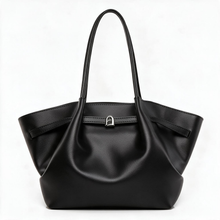 Black faux leather shoulder tote bag, front view on white background