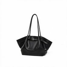 Black faux leather tote bag shown alone