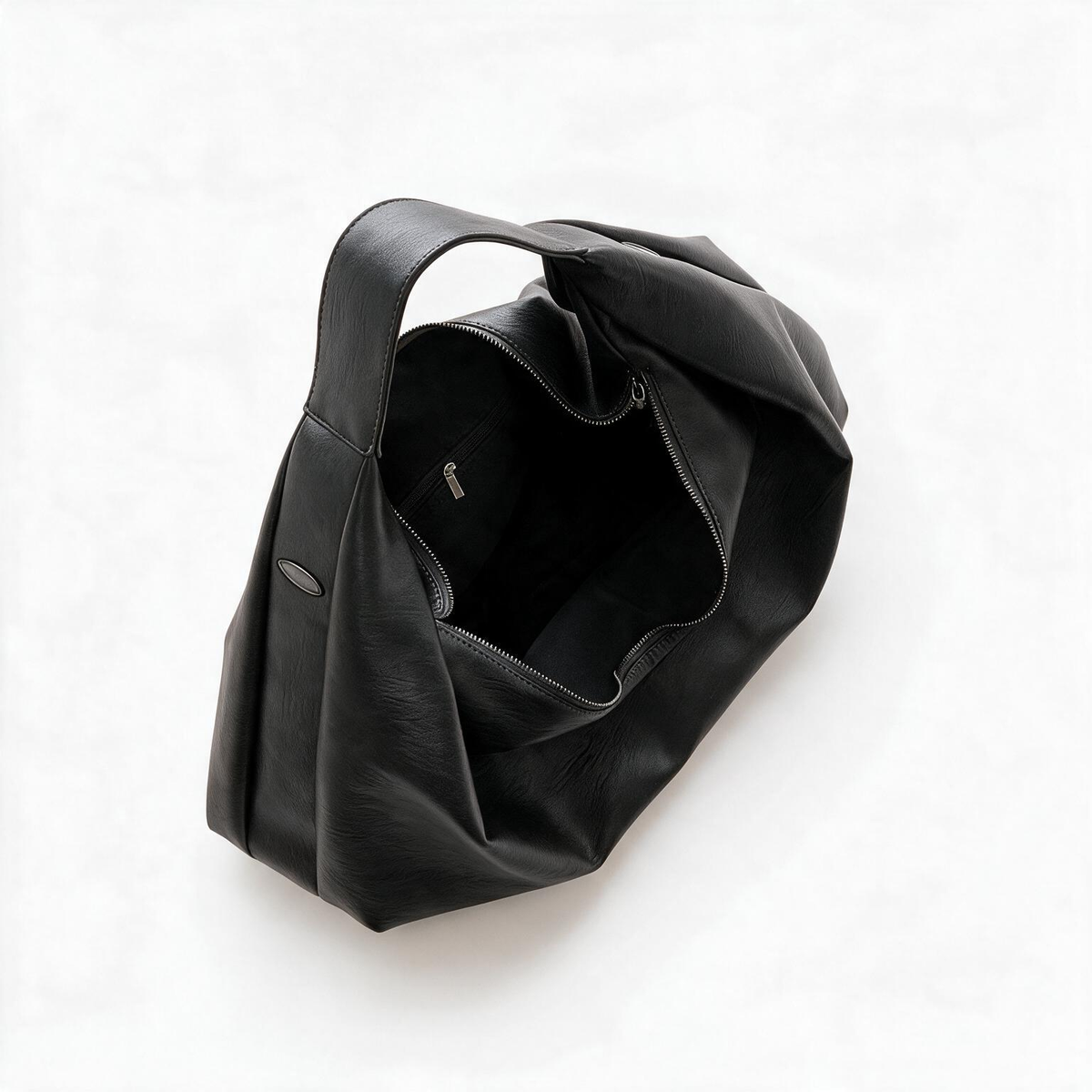 Open black slouchy tote showing the interior