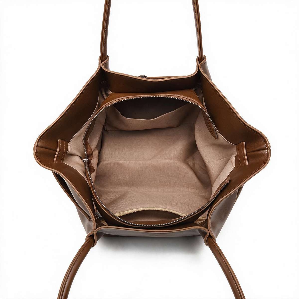 Open brown tote bag showing zip-top and interior